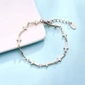 Polished silver stainless steel bracelet featuring hollow cross charms and K18 tag - Cross Link Bracelet (C021) / Silver