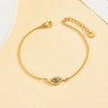 Detailed macro view of gold Evil Eye bracelet with blue zircon and S.steel hallmark - 18K Gold / Bracelet-Gold(SL7317-G)