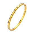 Detailed view of gold titanium steel bangle with inlaid zircons and square geometric grooves - Square Lattice Gold (HMSZ051-2)