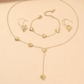 Elegantes goldenes Schmuckset mit Y-Halskette, Armband und hängenden Herzohrringen - Gold Herz Halskette Armband Ohrringe
