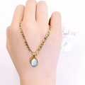 Collier en acier titane doré avec pendentif pierre vert menthe et chaîne Figaro - Or (Vert Menthe Zirconia)