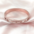 Rose gold hollow star bangle with double-row crystals on soft pink silk background - Rose Gold