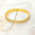 Luxurious gold-plated titanium steel bangle featuring double rows of studs and pavé zircons - Gold