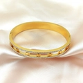 Golden hollow star bangle with double-row crystals on pink satin background - Gold