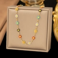 Gold necklace with colorful enamel daisy flowers displayed on a premium jewelry box - Colorful Daisy Necklace (H6191) / Gold