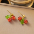 Sweet cherry drop earrings with red beads and green leaves on a golden stud setting - Cherry Earrings (EHG209) / Gold