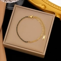Bracciale in acciaio inossidabile dorato con catena tennis in zircone nero e maglie a graffetta - Oro con zircone nero