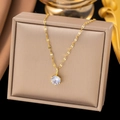Elegant six-prong solitaire pendant necklace with gold leaf chain on a jewelry gift box - Single Rhinestone Necklace (8189) / Gold