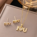 Detailed view of gold-plated I Love You jewelry set with sparkling heart pendant and studs - Letter IOU Set (8225) / Gold