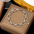Macro shot of twisted oval link stainless steel bracelet on a bronze luxury jewelry box - 【E2048】Twisted Rope Steel Bracelet