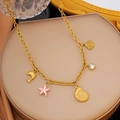 Collana a tema marino con ciondoli a stella marina dorata e tartaruga su catena a O - Collana Conchiglia Stella Marina Delfino (H1246)