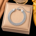 Polished silver stainless steel multi-strand braided chain bracelet on jewelry box - 8mm Mesh / Steel Color Bracelet (SLE2081)
