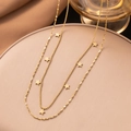 Zweilagige Sternen-Halskette mit goldener Perlen- und Kordelkette für Damen - Doppellagige Sternen Halskette (Gold)