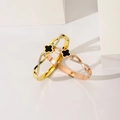 Elegante Armreifen in Roségold und Gold mit vierblättrigem Kleeblatt und Diamanten - Gold