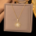 Gold plated sunburst necklace with moon and star zircon pendant on brown silk background - White Sunburst Style / Gold