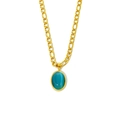 Détail d'une chaîne Figaro dorée avec pendentif ovale en pierre bleue sur fond blanc - Or Zirconium Bleu (X906)