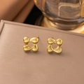 Minimalistische goldene Edelstahl-Ohrstecker in Blumenform mit hohlem, feinem Blumendesign - Rotierende Blumen / Gold