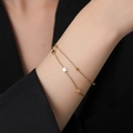 Double-layered golden titanium steel bracelet with polished star charms and beads for women - Double Layer Star Style (XKB0257) - Gold