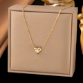 Minimalist gold heart necklace with clear zircon pendant on beige jewelry box display - XLH1140 White Diamond Heart / Gold