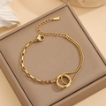 Asymmetric gold-plated titanium steel bracelet featuring round circles and mixed chain links - Circle Spliced Bracelet (S4280) / Gold