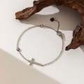 Silver-plated copper cross bracelet with clear zircon stone on a white background - 【e267】cross Bracelet Steel Color
