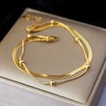Elegant gold double-layered bracelet with flat snake chain and metallic bead accents - 【e272】blade + Bead Bracelet Gold