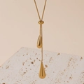 Elegant gold drop tassel necklace with adjustable slider on premium stone display - Waterdrop Necklace (X661) / Gold