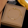 Elegant gold titanium steel bracelet featuring a zircon bow charm on a delicate bead chain - 【e73】zircon Bow Bracelet Gold