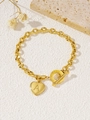 Gouden schakelarmband met OT-sluiting en hartvormige hanger met letter A gravure - Hart Letter A (Goud)