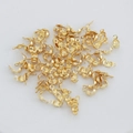 Macro shot of bright 18K gold plated bead tips for DIY jewelry making and necklace finishing - 3.6mm / 18K Gold