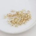 Macro view of 18K gold plated double loop crimp covers for DIY jewelry making supplies - 3.6mm / 14K Gold