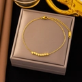 Elegant gold-plated bracelet featuring minimalist cube beads and adjustable lobster clasp - Eight Cubes Bracelet (E173) / Gold