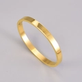 Polished gold titanium steel minimalist bangle with hidden side hinge closure - Gold