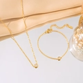 Minimalist gold-plated jewelry set featuring a single zircon necklace and matching bracelet - Gold Single Stone Necklace