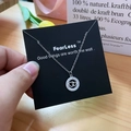 Elegant silver interlocking heart necklace with zircon circles on a black card - Silver Interlocked Heart Style (X523 Silver)