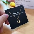 Gold plated heart pendant necklace with shimmering crystals on a black display card - Gold Hollow Heart Style (X511 Gold)