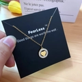 Elegant gold heart pendant necklace with rhinestones on a black gift card background - Gold Rhinestone Heart Style (X514 Gold)