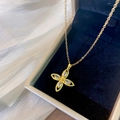 Golden clover necklace set with marquise-cut zircons displayed on black velvet - Gold Rhombic Flower Necklace (Titanium Steel)
