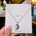 Halskette mit Stern- und Mondanhänger, Abalone-Muschel auf weißer Geschenkkarte - Silber Mond Stern
