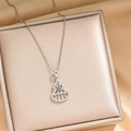 Silver zircon gourd abacus pendant necklace on elegant champagne satin jewelry box - Silver Gourd Abacus Style
