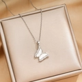 Silver titanium steel butterfly necklace with white shell inlay and sparkling zircons - Silver (X272)