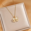 Elegant gold bow necklace with pavé cubic zirconia pendant on a luxurious jewelry box - Large Gold Bowknot