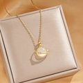 Elegant gold planet pendant necklace with opal bead and star on champagne silk - Gold Opal Planet