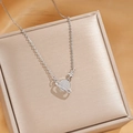 Silver-plated planet and star necklace with micro-pave zircons on a champagne jewelry box - Silver Ringed Planet