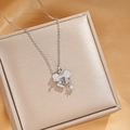 Elegant silver bow pendant necklace with sparkling cubic zirconia on a champagne silk base - Silver White Zircon Bow