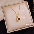 Detail view of purple zircon crown pendant necklace with dimensions 19x12mm and 40+5cm chain - Lucky Stone Crown (D63)