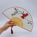 Traditional Chinese folding fan with red floral embroidery and silk tassel detail - 2026 Hot Selling Item - Suzhou Embroidery Fan - Good Fortune