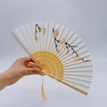 White silk folding fan with floral embroidery, bamboo frame, and beige tassel pendant - 2026 Hot Selling Item - Suzhou Embroidery Fan - Abundant Wealth