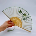 Traditional bamboo folding fan with green bamboo embroidery and jade tassel detail - 2026 Hot Selling Item - Suzhou Embroidery Fan - Rising Steadily