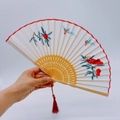 Traditional silk embroidery folding fan with red peony and bird on bamboo frame - 2026 Hot Selling Item - Suzhou Embroidery Fan - Good Things Come In Pairs